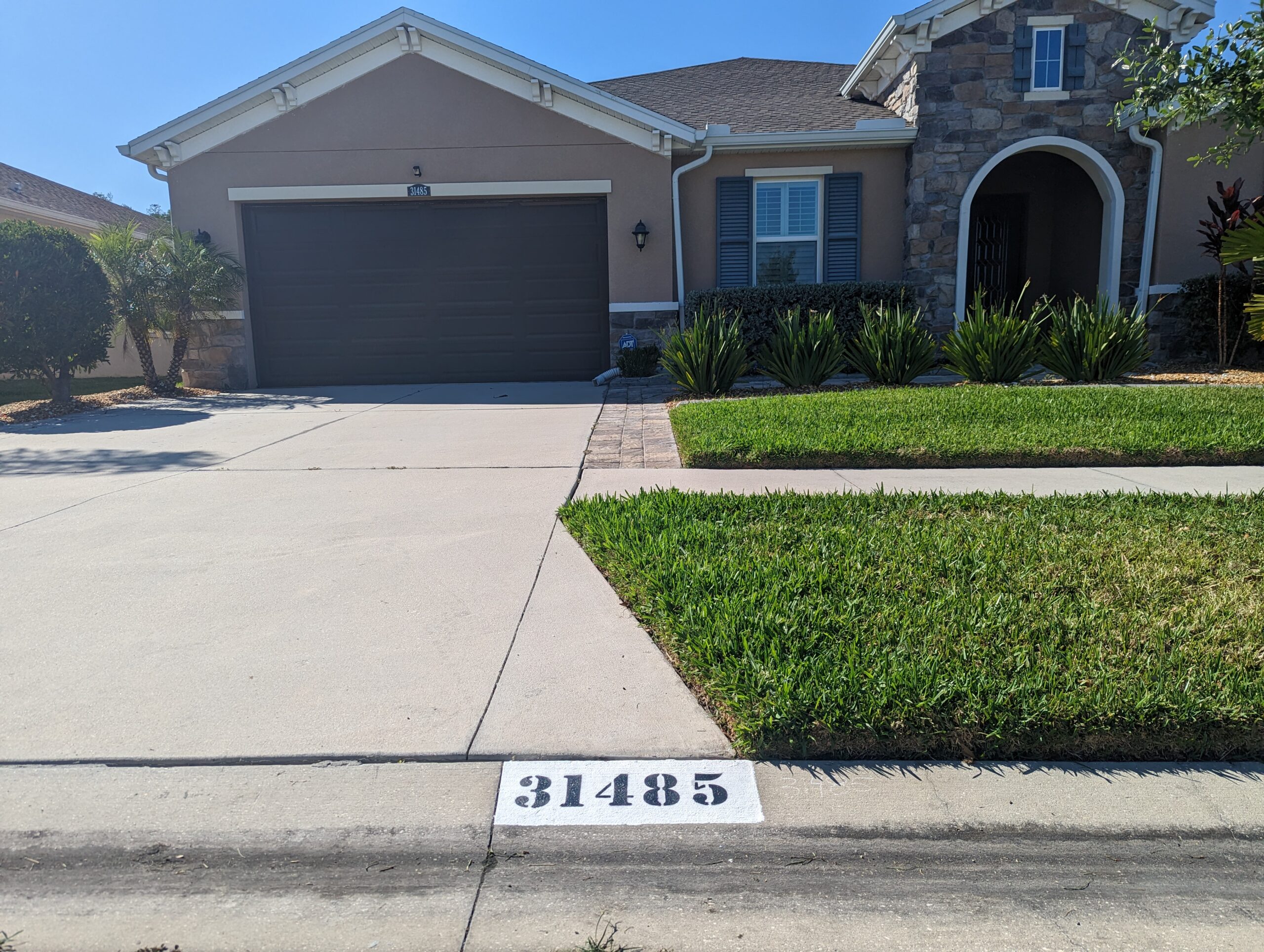 Modern house with curb number